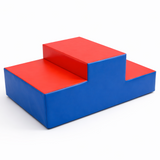 Red and blue foam blocks on a white background